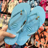 Havaianas Slim Glitter Neon + Pingente Olho Grego Pequeno Azul